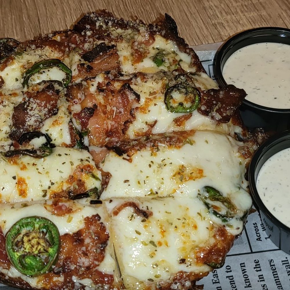 Two Cities Pizza - Bacon and jalapeño appetizer - Pizza Near Me - Suwanee, Georgia Two Cities Pizza - Bacon and jalapeño appetizer - Pizza Near Me - Suwanee, Georgia