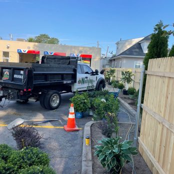 Northscapes - a truck parked in a yard - Landscaping Near Me - Cranston, Rhode Island Northscapes - a truck parked in a yard - Landscaping Near Me - Cranston, Rhode Island