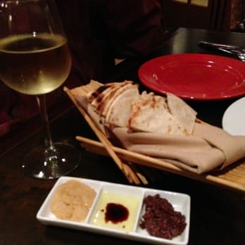 Esteban Restaurant - Complimentary pita bread, hummus, olive tepanade and a balsamic vinegarette - Spanish Near Me - Monterey, California Esteban Restaurant - Complimentary pita bread, hummus, olive tepanade and a balsamic vinegarette - Spanish Near Me - Monterey, California