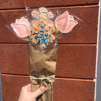 Baked - Handcrafted Sips + Sweets - a person holding a bouquet of cookies - Bakeries Near Me - Hillsboro, Missouri