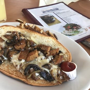 Quickie Too - I forgot the name but this sandwich has Seitan, mushrooms and spicey fries. So good! - Wraps Near Me - Tacoma, Washington Quickie Too - I forgot the name but this sandwich has Seitan, mushrooms and spicey fries. So good! - Wraps Near Me - Tacoma, Washington