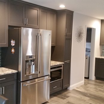 Mineo Home Improvements - a kitchen with stainless steel appliances - General Contractors Near Me Mineo Home Improvements - a kitchen with stainless steel appliances - General Contractors Near Me