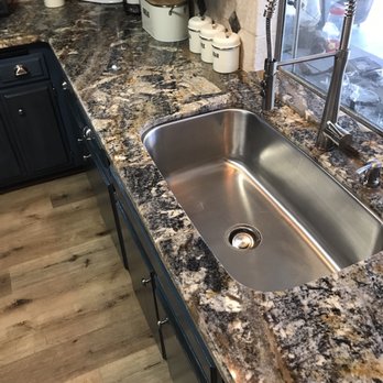 My Floors Direct - a kitchen with granite countertops - Flooring Near Me - Murrieta, California