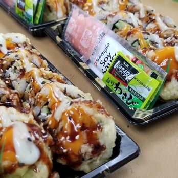 Chevron - two trays of sushi on a table - Gas Stations Near Me - Sequim, Washington