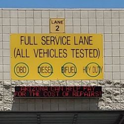 Vehicle Emissions Inspection - The signs indicating what style of vehicles and the testing types they will accept in each lane.