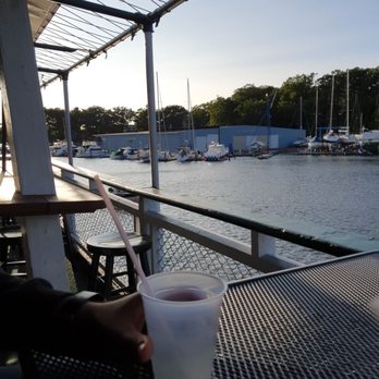 Idler Riverboat - a person holding a cup of coffee - American Near Me - South Haven, Michigan Idler Riverboat - a person holding a cup of coffee - American Near Me - South Haven, Michigan