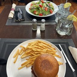 Korean chicken burger and Harvest Signature House Salad Korean chicken burger and Harvest Signature House Salad
