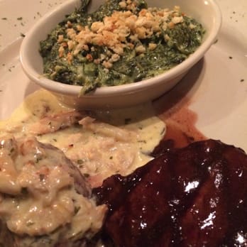 Bullfish Grill - 2 4oz filet mignon medallions with spinach side. - Steakhouses Near Me - Pigeon Forge, Tennessee