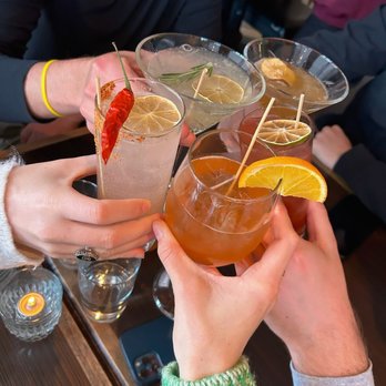 SoCal Kitchen - a group of people toasting with drinks - American Near Me - Mont-Tremblant, Quebec