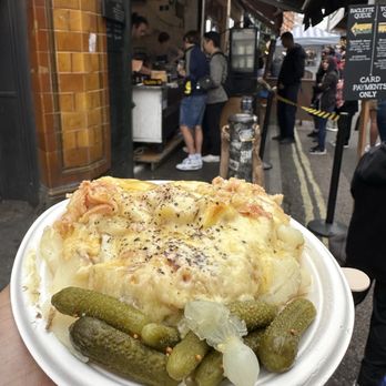 Kappacasein - Raclette over potatoes. - Cheese Shops Near Me - London, XGL Kappacasein - Raclette over potatoes. - Cheese Shops Near Me - London, XGL