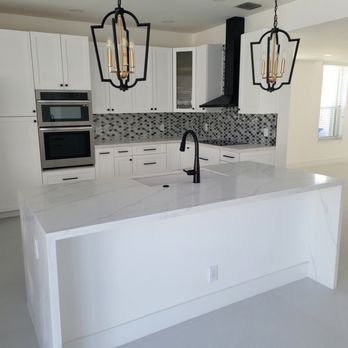 Anmar Home Solutions - a kitchen with a large island - Flooring Near Me - Fort Lauderdale, Florida Anmar Home Solutions - a kitchen with a large island - Flooring Near Me - Fort Lauderdale, Florida