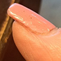 Thumb; no top coat & sides not polished Thumb; no top coat & sides not polished
