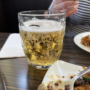 Thai Village - a glass of beer and a plate of food - Thai Near Me - Uxbridge, Ontario Thai Village - a glass of beer and a plate of food - Thai Near Me - Uxbridge, Ontario