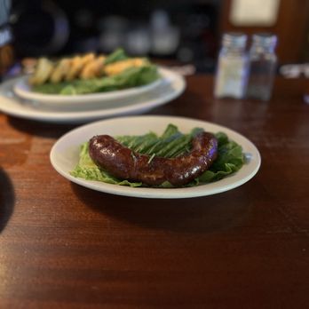 Liuzza's Restaurant & Bar - This is the hot sausage. So flavorful. - Italian Near Me - New Orleans, Louisiana Liuzza's Restaurant & Bar - This is the hot sausage. So flavorful. - Italian Near Me - New Orleans, Louisiana