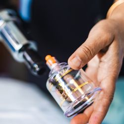 Victoria De Winter, LMT - Nola Mobile Massage - Cupping therapy, quick and extremely efficient in breaking adhesions by myofascial decompression and increase range of motion.