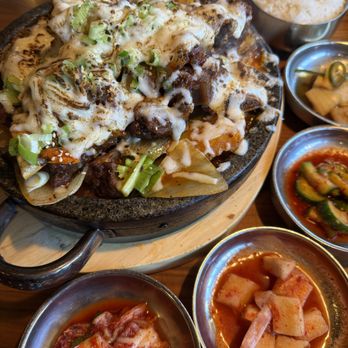 Jin Cook - Spicy braised beef short rib with cheese + banchan - Korean Near Me - Buena Park, California Jin Cook - Spicy braised beef short rib with cheese + banchan - Korean Near Me - Buena Park, California