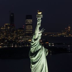 Helicopter Flight Services - Statue of liberty at night
