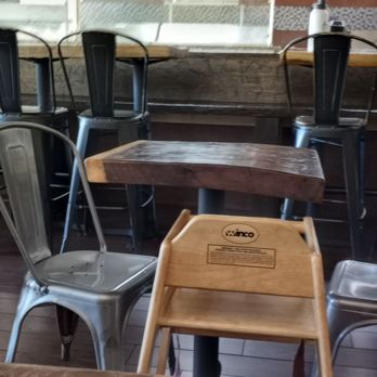 Rico Tropical Grill - INTERIOR SEATING AND KIDS HIGH CHAIRS - Caribbean Near Me - Kennesaw, Georgia