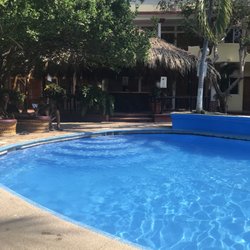 Acuario - There are tikis for shade beside the pool...