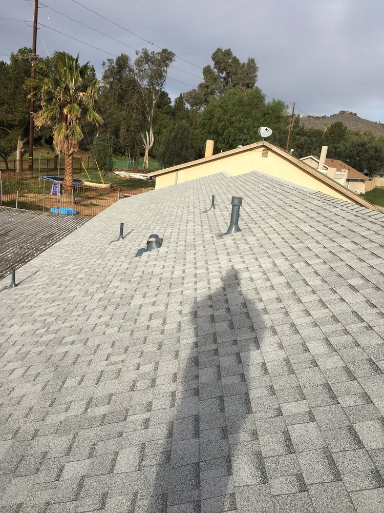 Slide of Thompson Roofing