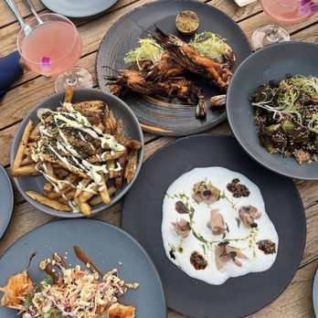 Streeterville Social - a variety of plates of food - Cocktail Bars Near Me - Chicago, Illinois