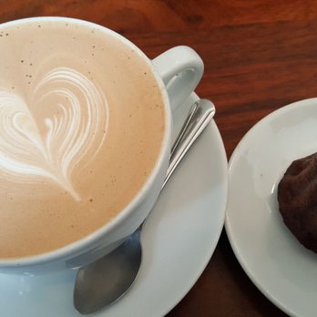 Courier Coffee Roasters - Mocha and a canele at the counter (9/26/19) - Coffee Roasteries Near Me - Portland, Oregon