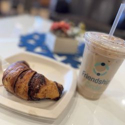 Friendship Cafe & Bakery - Horchata Cold Brew and Chocolate Croissant