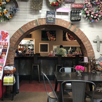 Bloomin' Bean Coffee Bar - Sitting in flower shop. Coffee served thru the arch. - Coffee & Tea Near Me - Blythewood, South Carolina