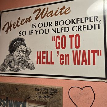 Bucksnort Saloon - The " welcoming " sign in the ladies restroom - American Near Me - Pine, Colorado