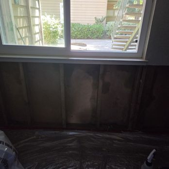Valley Oak - MOLD- 2nd bedroom, under stripped back wall, MOLD they painted Over, replaced plywood. MOLD is STILL There!! - Apartments Near Me - Modesto, California