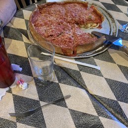Stuffed pizza was very tasty but more than anyone can eat Stuffed pizza was very tasty but more than anyone can eat