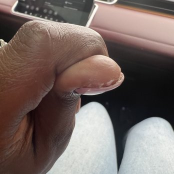 Basecoat Nail - Polish left under my nail by technician 2 - Nail Salons Near Me - Charlotte, North Carolina