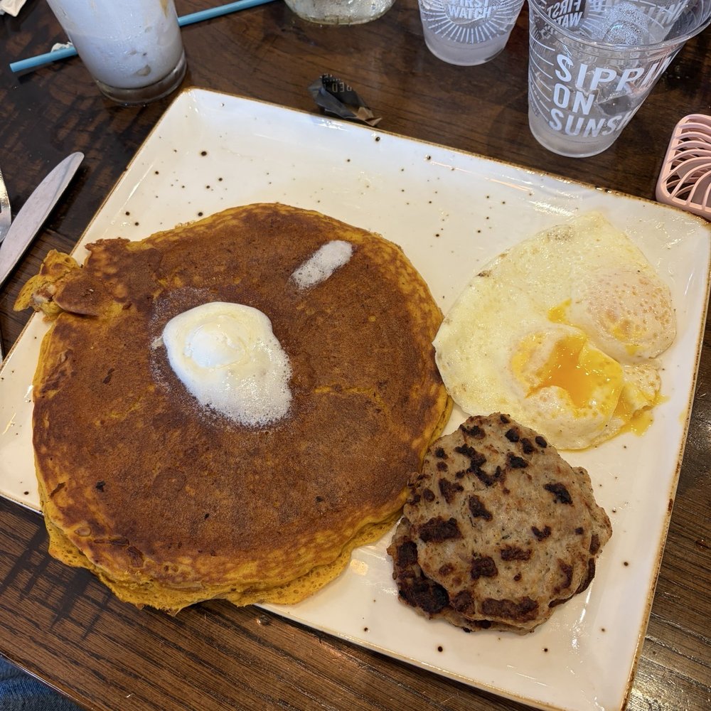 First Watch - Seasonal pumpkin pancake plate (pumpkin pancake, chicken sausage and over medium eggs) - Cafes Near Me - Hampton, Virginia