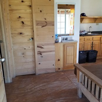 Las Cañadas Campamento - Bathroom through that door. Very small. Just toilet and shower. Sink with mirror - Amusement Parks Near Me - Ensenada, BCN