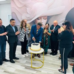 Grace n Style - Mayor cutting cake for grand opening
