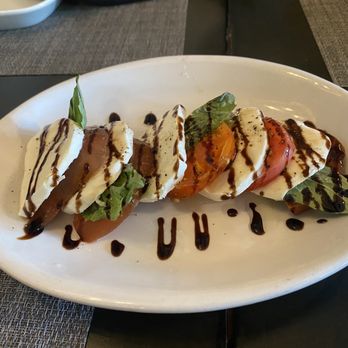 Mankas Grill - Heirloom tomato caprese - American Near Me - Fairfield, California Mankas Grill - Heirloom tomato caprese - American Near Me - Fairfield, California