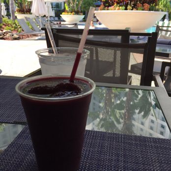 Tropics Pool Bar - Hilton Orlando - Refreshing blueberry mocktail - Sports Bars Near Me - Orlando, Florida