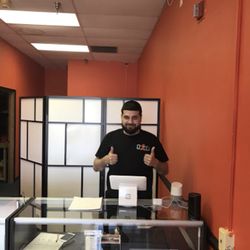 Phone Physician Phone Repair - Our new hire ready to repair phones! Trained in our three week program to become a master in phone repairs.