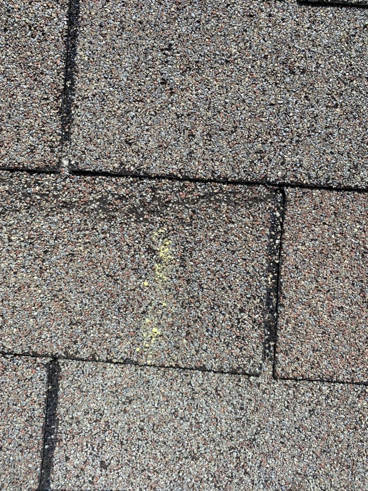 Slide of The Roofing Experts