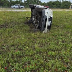 Hook M Up Towing - "Off-road recovery in action -- our team specializes in safely up righting and recovering vehicles from tough spots.
