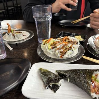Kaiten Zushi - Shrimp with a bitter brown sauce, Godzilla roll, octopus hand roll, red snapper sushi - Sushi Bars Near Me - New York, New York Kaiten Zushi - Shrimp with a bitter brown sauce, Godzilla roll, octopus hand roll, red snapper sushi - Sushi Bars Near Me - New York, New York