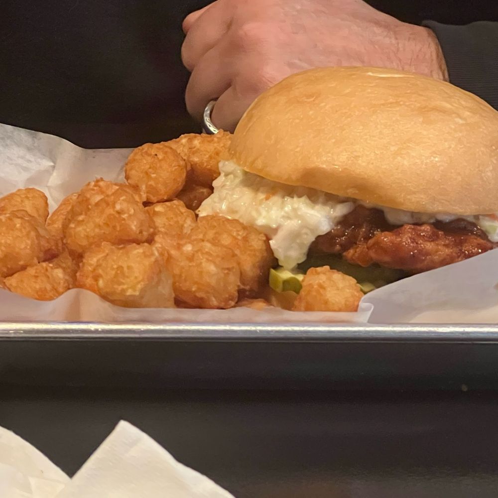 Hot chicken Sammy with tots.Good but messy!