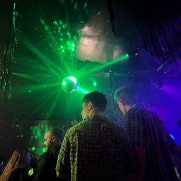 a group of people at a nightclub