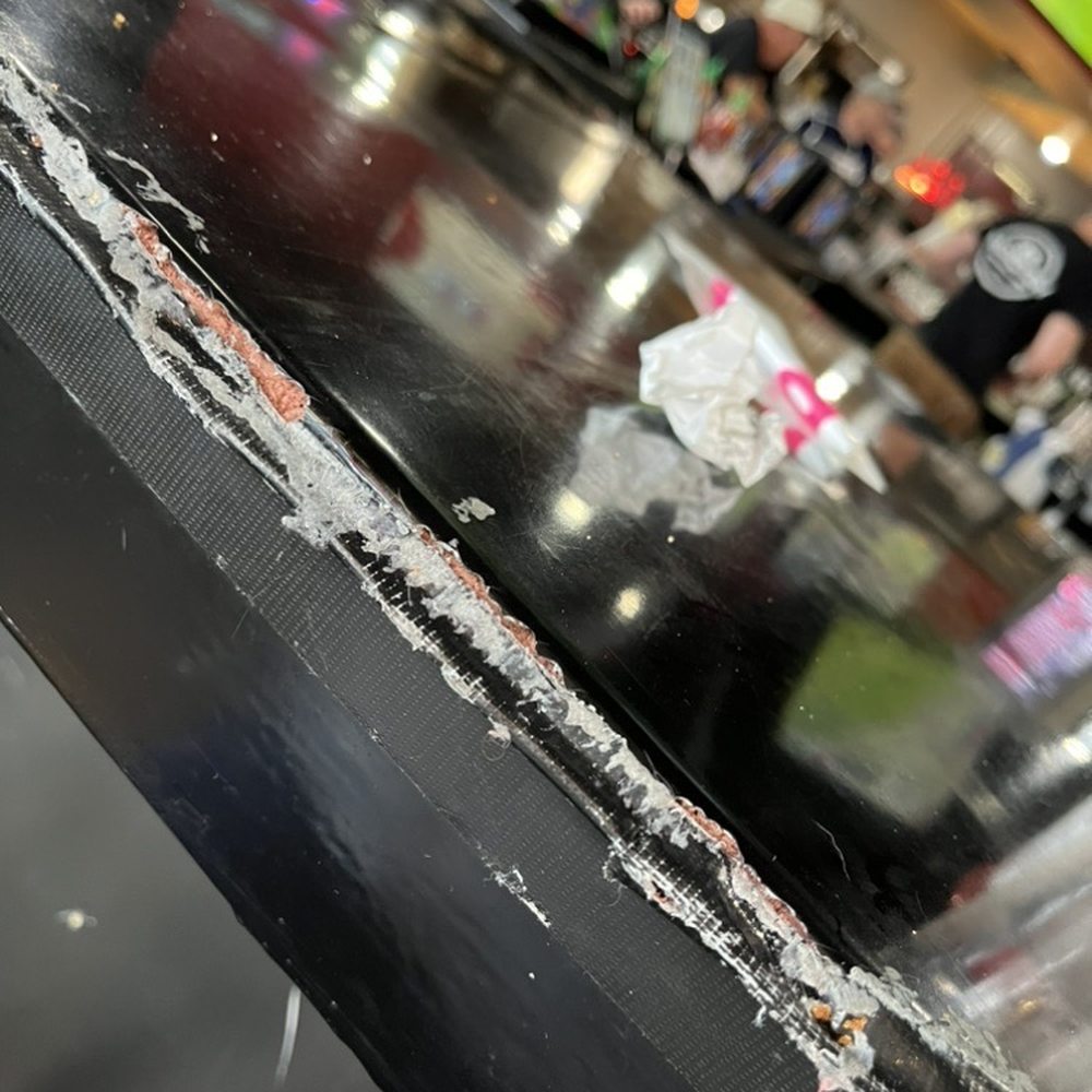 Mad Cow - The duct tape on the bar - Burgers Near Me - Eagan, Minnesota Mad Cow - The duct tape on the bar - Burgers Near Me - Eagan, Minnesota
