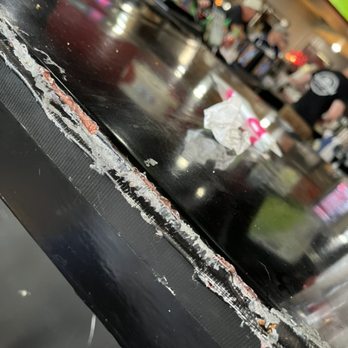 Mad Cow - The duct tape on the bar - Burgers Near Me - Eagan, Minnesota