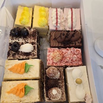 Classic Bakery - L to R: Mango, Raspberry, Black Forest, Chocolate Truffle, Red Velvet, Carrot Cake, Tiramisu, Vanilla Bean. - Bakeries Near Me - Olney, Maryland