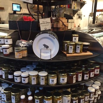 Cochon Butcher - Look at that counter full of sauces! - Sandwiches Near Me - New Orleans, Louisiana