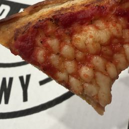 Strange pattern on crust under the toppings Strange pattern on crust under the toppings