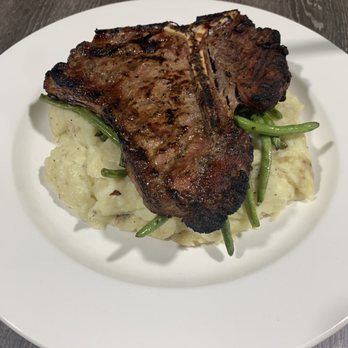 Challenger Tap House - T-bone with garlic mashed and haricots verts(green beans) - Sports Bars Near Me - Lancaster, California Challenger Tap House - T-bone with garlic mashed and haricots verts(green beans) - Sports Bars Near Me - Lancaster, California