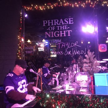 Ernie Biggs - a band performing in front of a stage - Music Venues Near Me - Springfield, Missouri